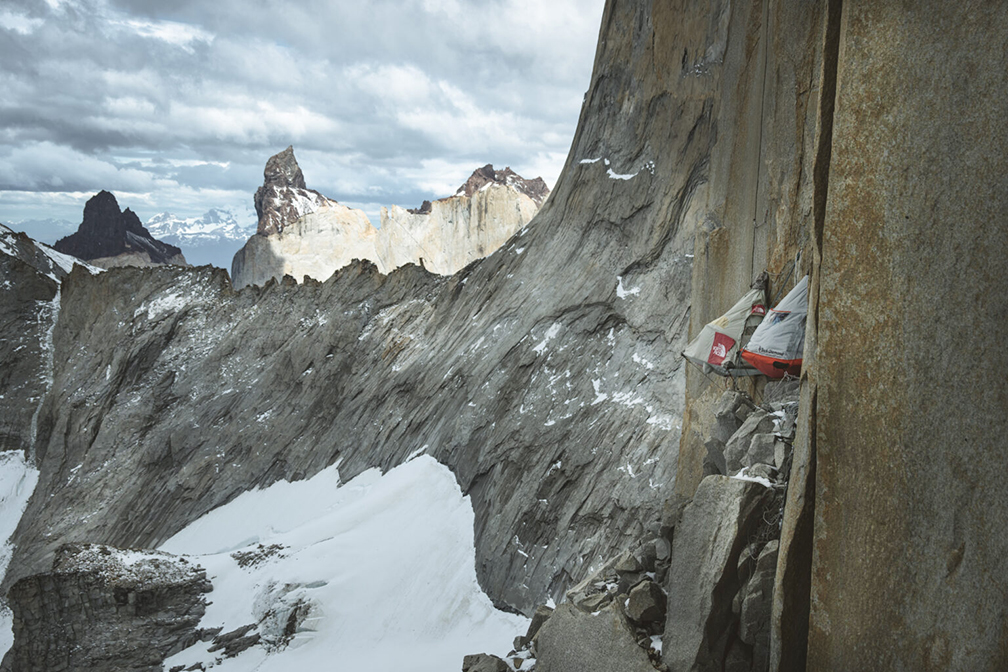 Two portaledges hanging on the wall.