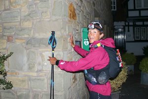 Anna Troup touches the wall at the Border Hotel in Kirk Yetholm