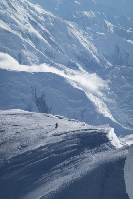A lonely climber on a huge snow ridge on Denali. 